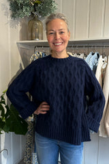 STUDIO WYLDER CABLE SWEATER IN NAVY